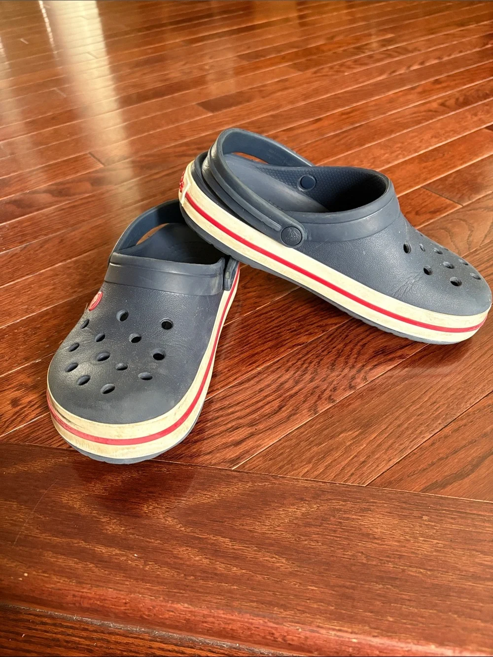 CROCS Kids Navy Clogs with Red and White Trim
